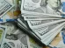 Dólar e Bolsa fecham em queda com dados de atividade econômica do Brasil