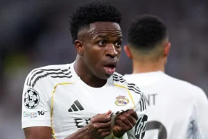 Vini Jr. marca e dança, Real vence Benfica e vai às oitavas da Champions