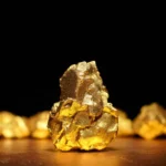 Ouro fecha em alta com dólar fraco em meio a sinais de alívio geopolítico no Irã