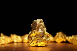 Ouro fecha em alta com dólar fraco em meio a sinais de alívio geopolítico no Irã