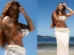 Paolla Oliveira divulga ensaio de topless na praia