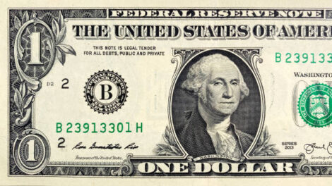 Dólar cai ao menor valor desde junho com alta do petróleo