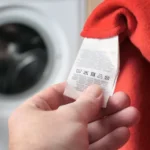 Você sabe o que significam os símbolos nas etiquetas das roupas?