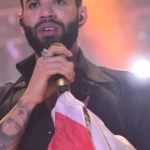 Gusttavo Lima terá de indenizar fã expulsa de show após 'fazer o L'