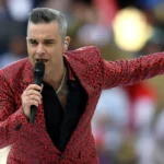 Robbie Williams retorna ao Brasil e quer mostrar que é o 'mestre do entretenimento'